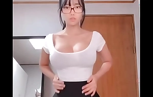 hot Asian girl relating to big tits teases