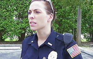 Female cops be over black suspect and suck his cock