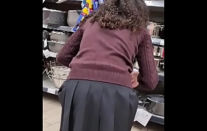 Spying teen woman handy supermarket - short skirt
